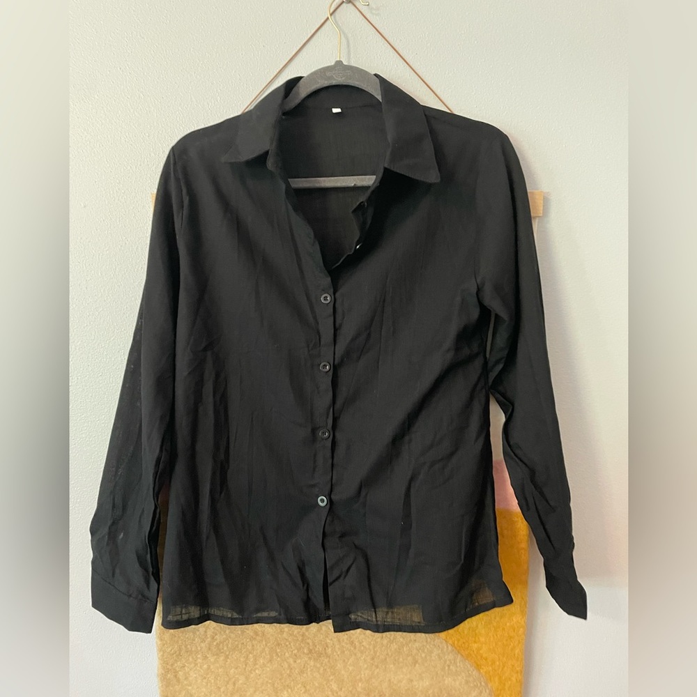 Size medium black loose fitting button down shirt